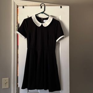 Black Fit and Flare Dress with White Collar and sleeves.